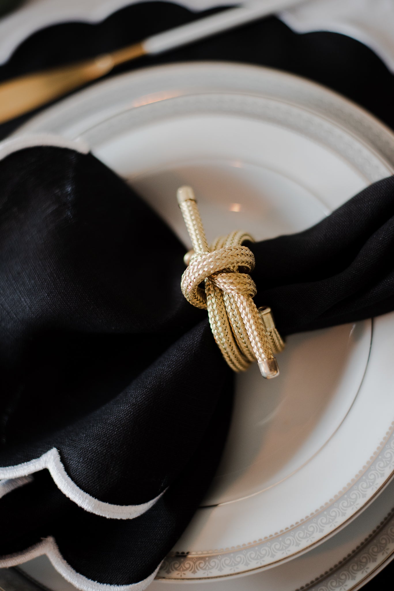 Black and gold store napkin rings