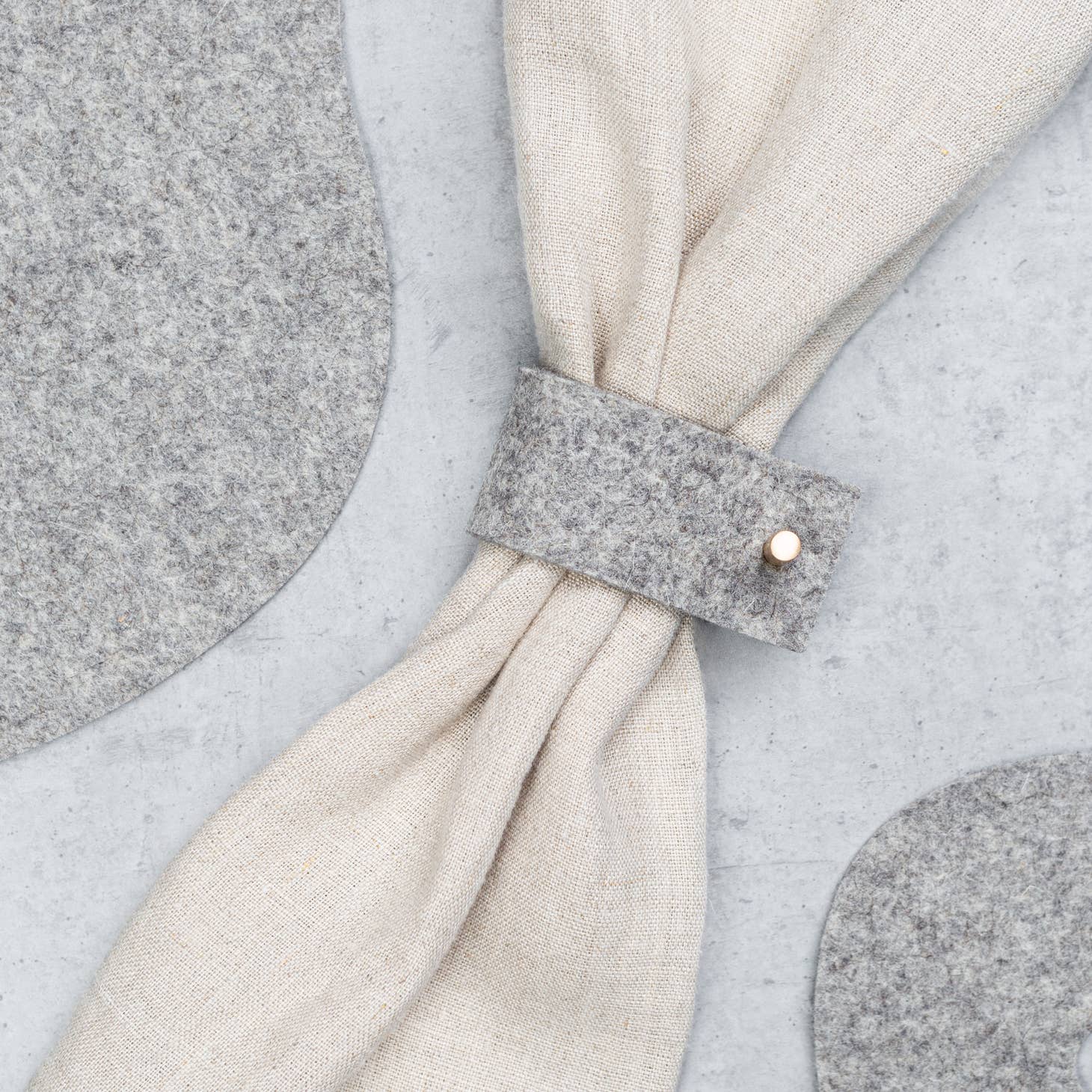 Beautiful natural felt napkin ring with metal accent 