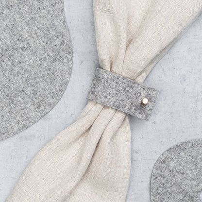Beautiful natural felt napkin ring with metal accent 