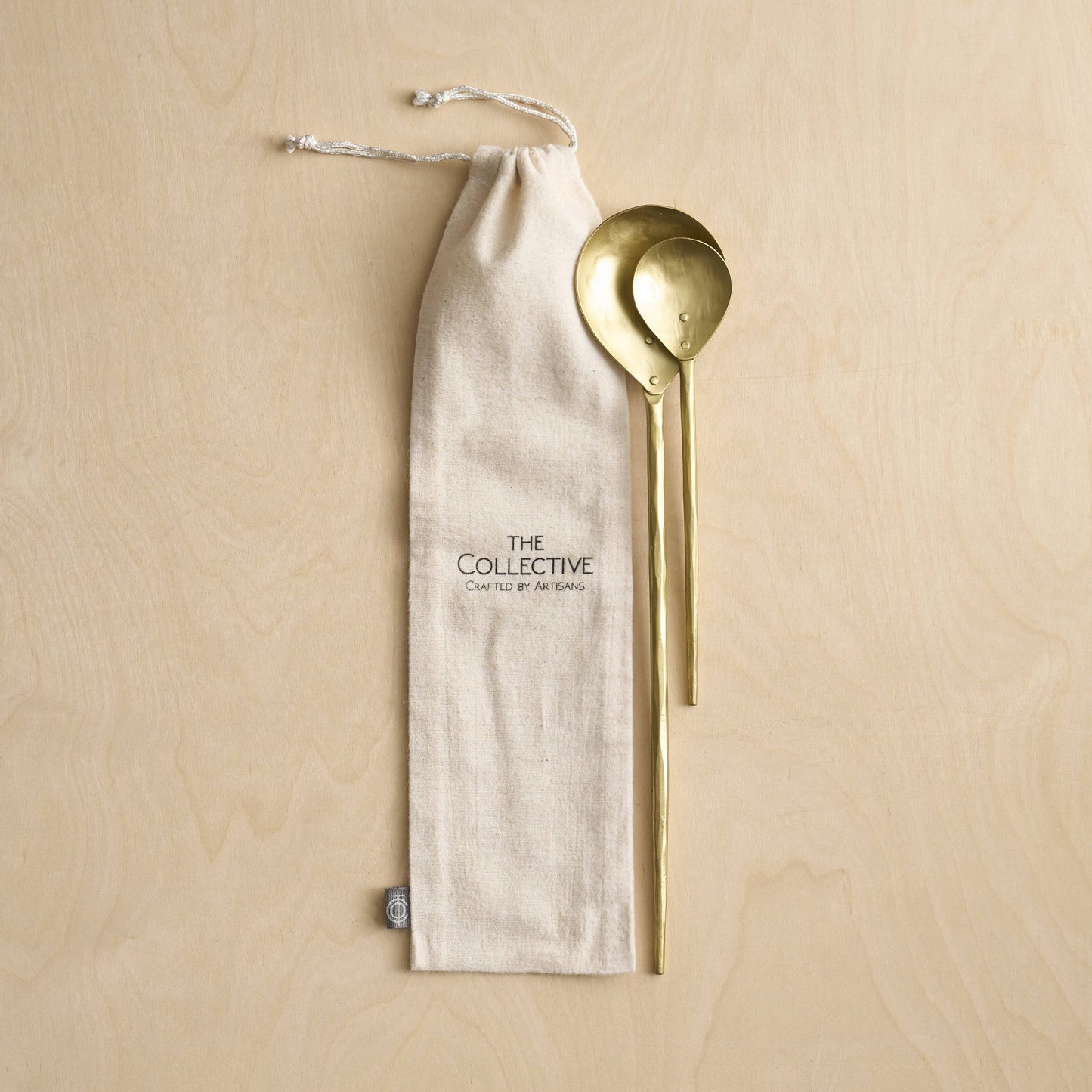 beautiful gold metal serving spoons from the collective beau and nest
